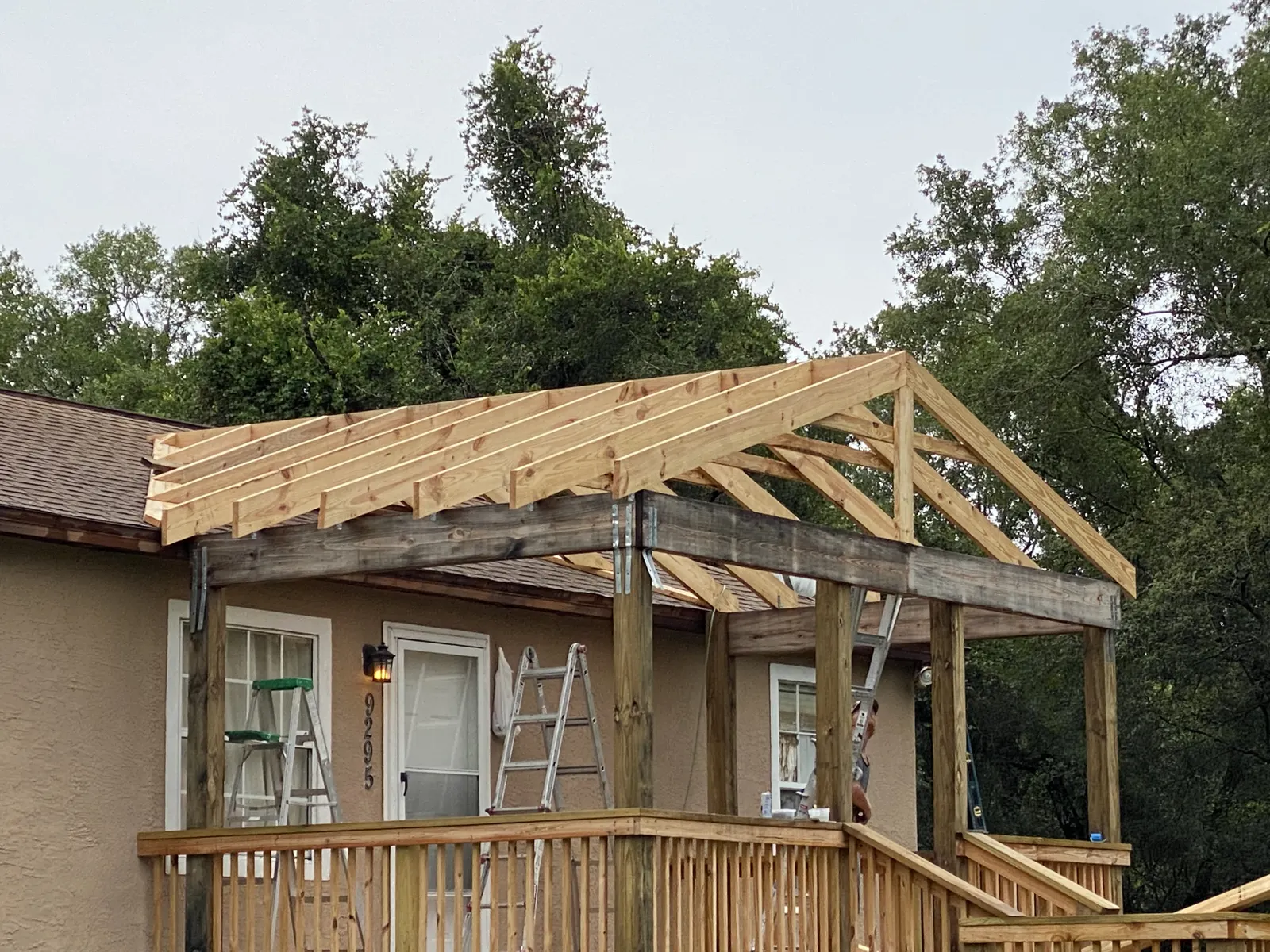 New porch roof trusses framed after wind damage near Alsip, IL
