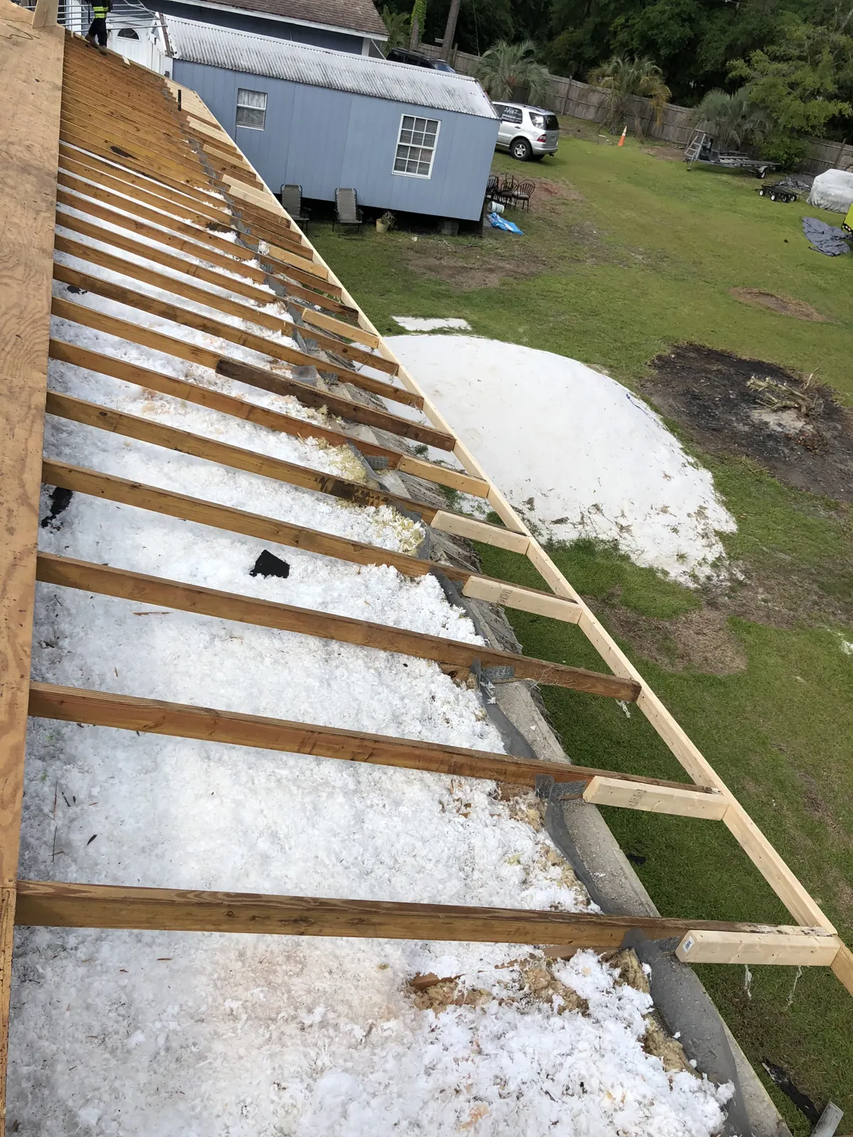 Rebuilt rafter tails and new fascia board on an older home in Elgin, IL