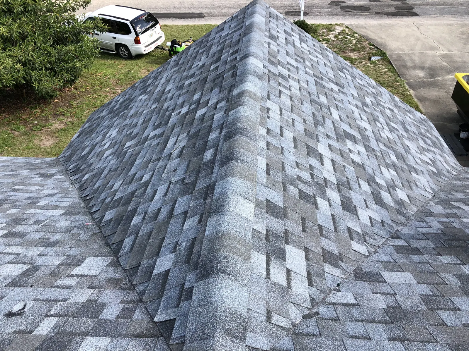 Steep hip shingle roof on an older home in Riverside, IL